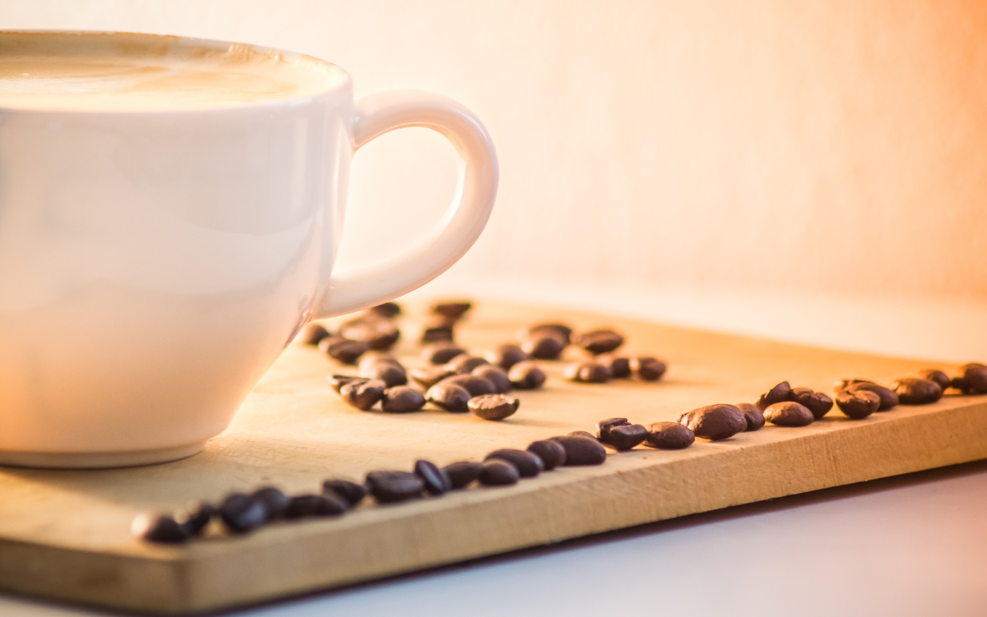 coffee cup with beans wallpaper background