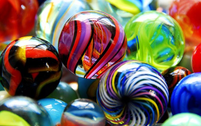 colored glass marbles wallpaper background