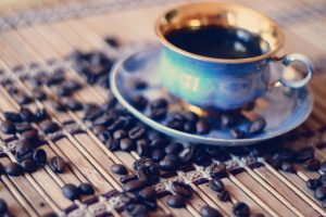 cup of coffee with coffee beans wallpaper background